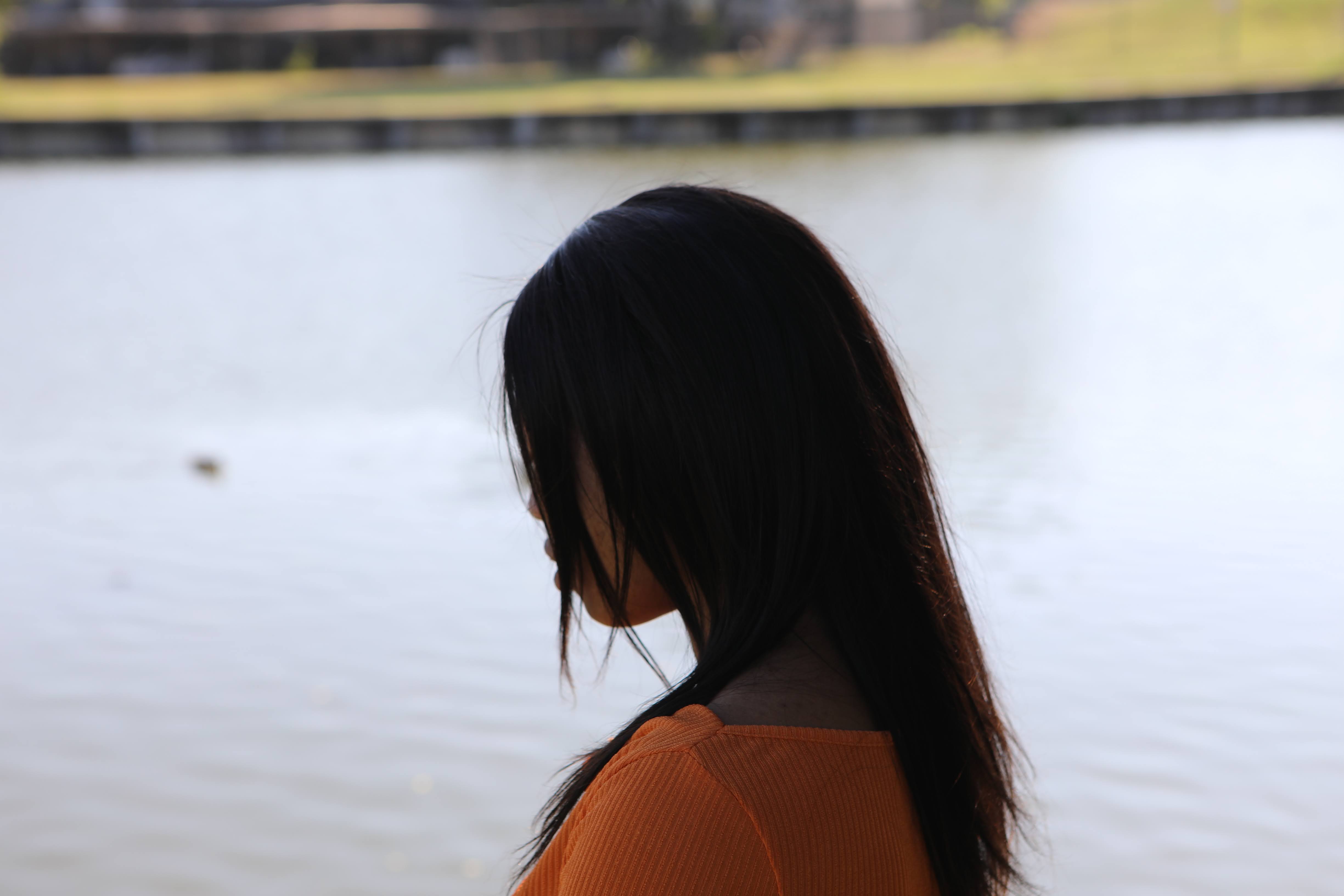 Lakeside lifestyle portrait with soft background blur